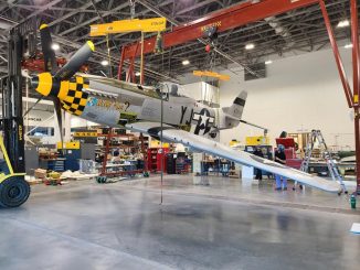 P 51D being lifted in a 22 degree roll in the Engen Restoration Hangar Smithsonian Photo by Richard Snell