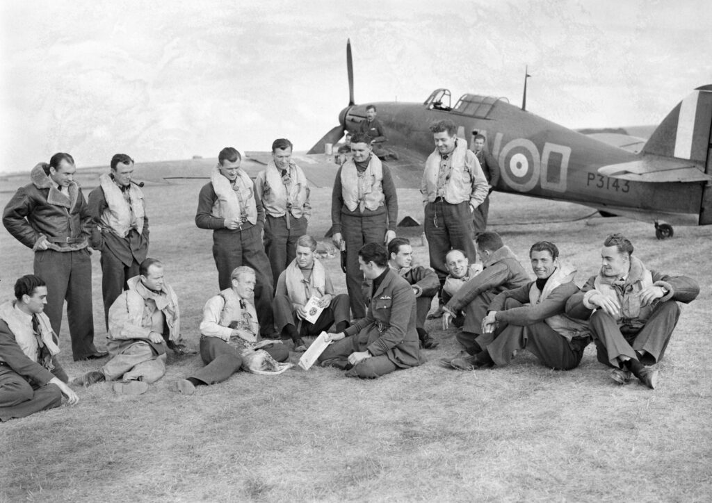 The men of 310 (Czechoslovak) Squadron RAF pose with Hurricane P3143/NN-D during the Battle of Britain. The paint scheme of this aircraft is being meticulously applied to P3351 as a flying tribute. [Photo from Zdeněk Hurt Archiv courtesy Letecké Muzeum Točná/Tocna Airport]