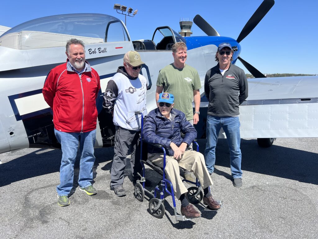 Paul Crawford after the successful flight with (L to R), Cullen Underwood (Camera ship pilot), Bob Bull, Ray Fowler and Rodney Allison. 