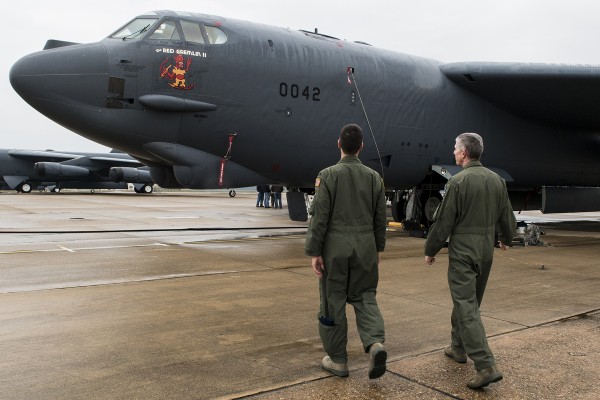 U.S. Air Force Col. Paul Tibbets IV (left) gets a closer look at the nose art on a 93rd Bomb Squadron B-52H Stratofortress, which resembles the nose art flown on the side of a B-17 bomber his grandfather piloted during World War II, at Barksdale Air Force Base, La., Nov 15, 2013. Brig. Gen. Paul Tibbets Jr., was best known for his atomic mission in the B-29 during World War II. (U.S. Air Force photo by Master Sgt. Greg Steele/Released)