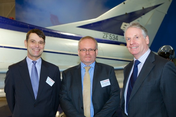 Peter Dye, RAF Museum Director General and Chris Boardman, Managing Director of BAE Systems’ Military Air & Information pose in front of the EAP.( Image credit '©Trustees of the Royal Air Force Museum’)