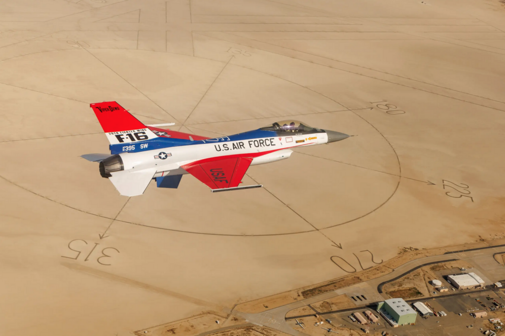 Photo of the 50th anniversary jet flying over Edwards AFBs famed lakebed compass. USAF Viper Demonstration Team