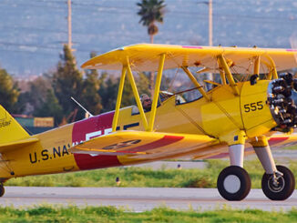 PT-17 Stearman 41-8746/N555BF arrives at Chino. [Photo via Planes of Fame]