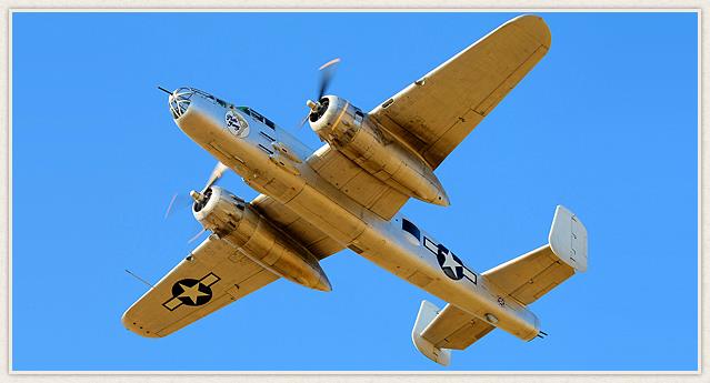 Planes of Fame's B-25J known as 'Photo Fanny' aloft over Chino, California. (photo via Planes of Fame)