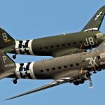 Project Two restored Douglas DC 3 C 47 Dakota Skytrains in formation during an airshow