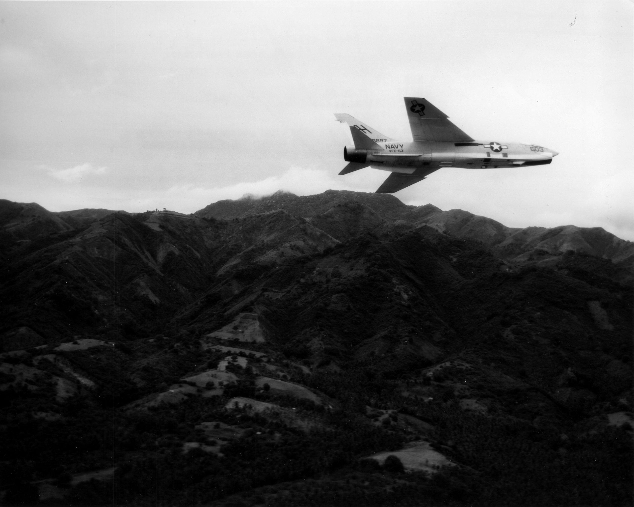 Travel For Aircraft Bookshelf - F8U Crusader by Ernest M. Snowden 15 RF 8G of VFP 63 flying from USS Oriskay CVA 34 over South Vietnam rolling in on a recce run in 1966 credit NARA 1116640 scaled