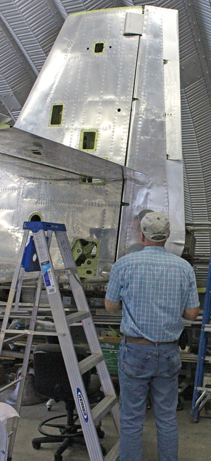 Tom Reilly inspecting the freshly-installed, right-hand rudder. (photo via Tom Reilly)