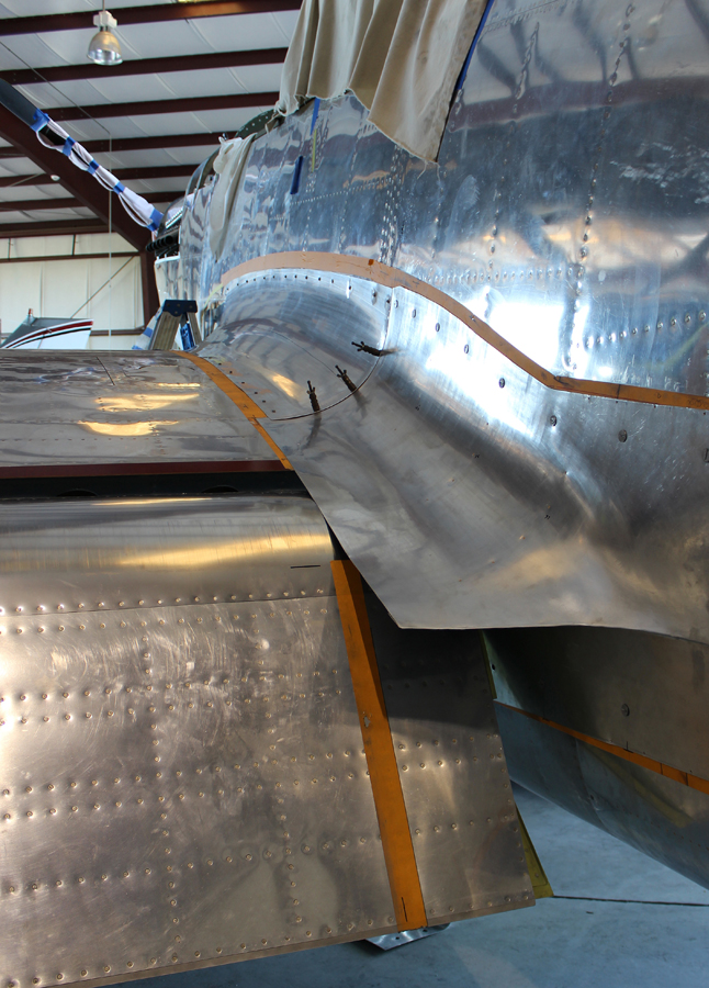 The righthand inboard fuselage-to-center section fairing in place during trial fitting. (photo via Tom Reilly)