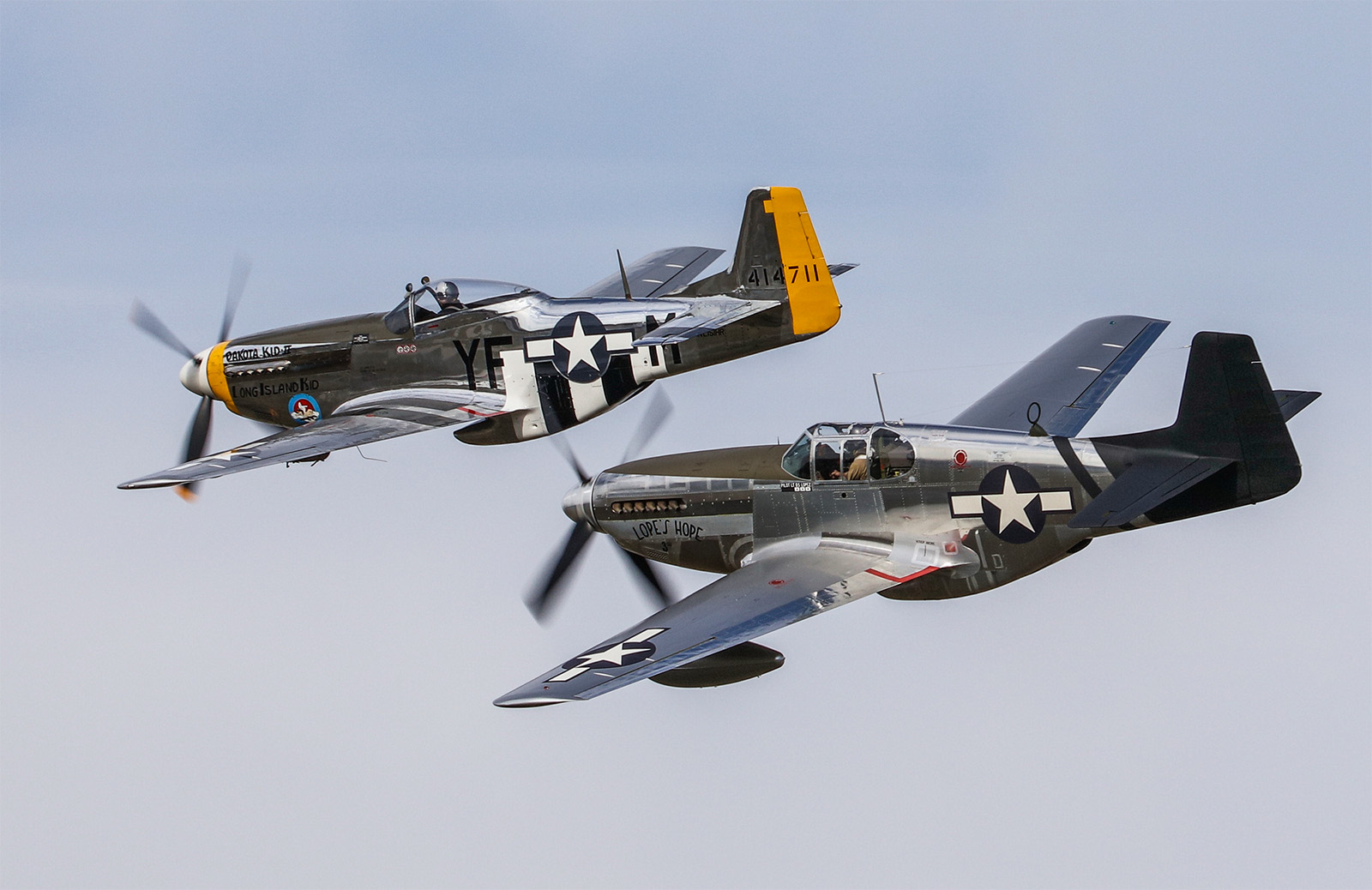Lopes Hope 3rd in close formation with the P-51D chase plane for the test flight, TFLM's Dakota Kid. (photo by Randy Ruttger via AirCorps Aviation)