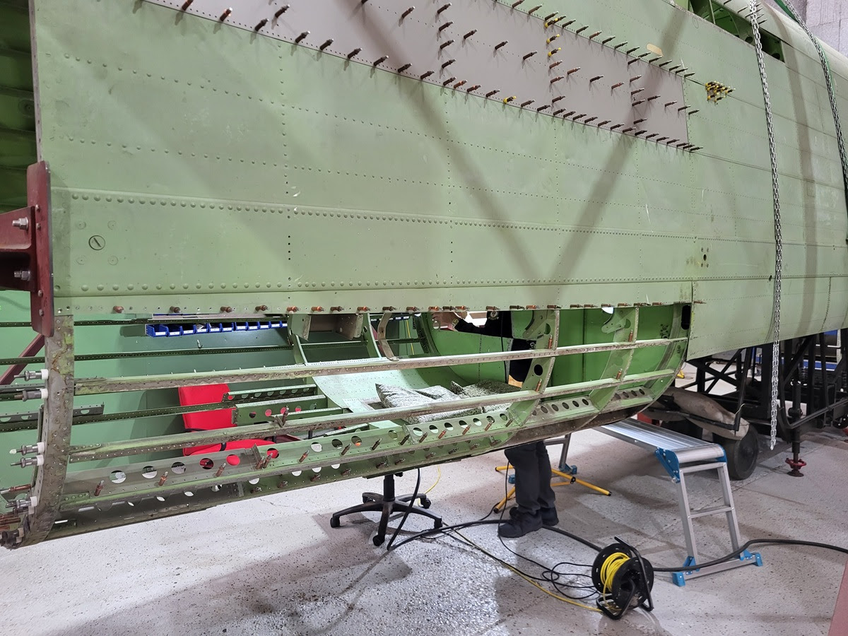 Rear end of the rear mid fuselage of NX664 with the skins removed exposing the structure that requires inspection and repair