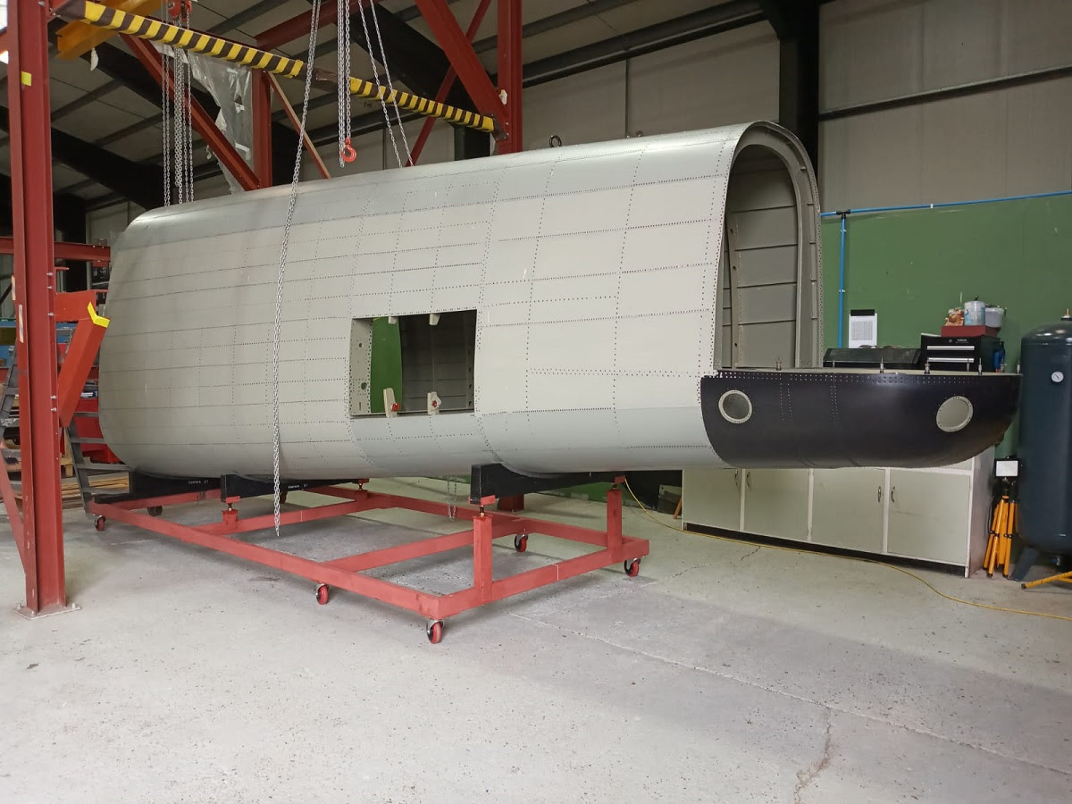 Rear fuselage of NX611 on its transport