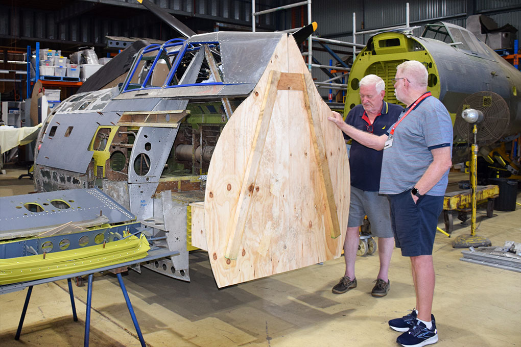 P-47 Thunderbolt Restorations Progress in Australia, Including Proposed Two-Seat Conversion 16 Republic P 47D prototype for a unique two seat conversion inspected by John Parker right and Robert Greinert left