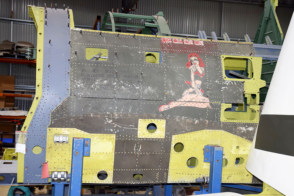 P-47 Thunderbolt Restorations Progress in Australia, Including Proposed Two-Seat Conversion 14 Republic P47 D 42 22687 in the workshop undergoing a full rebuild with a view of artwork