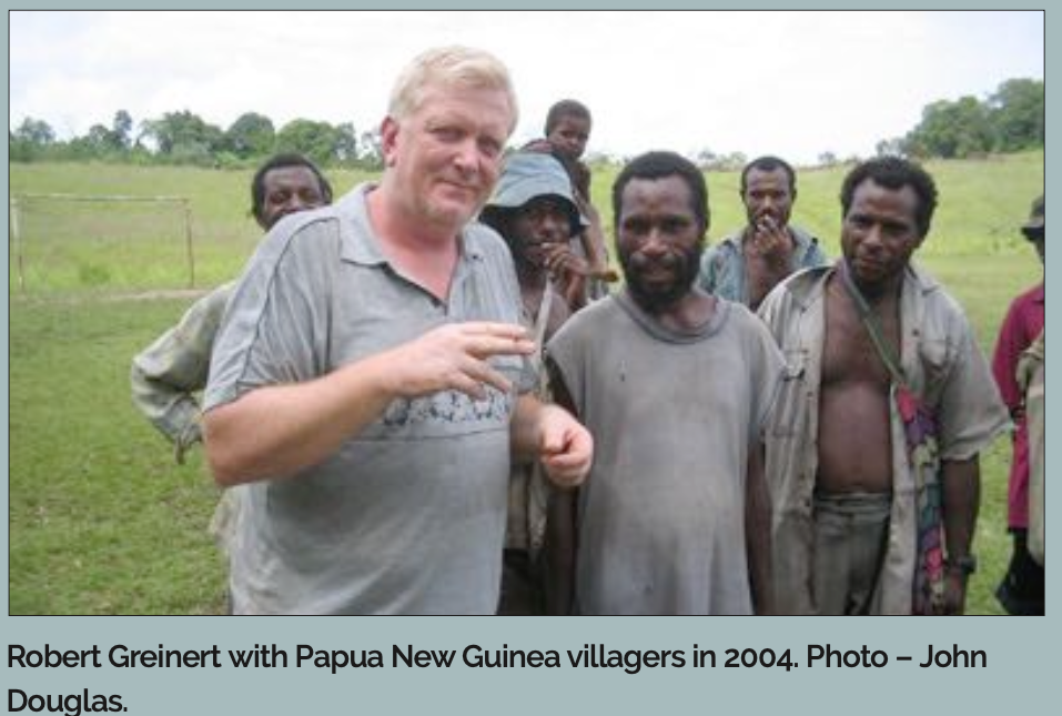 The Swamp Ghost and the Fight to Protect Pacific War Wrecks 15 Robert Greinert with Papua New Guinea villagers in 2004