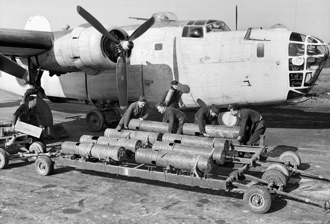 Travel For Aircraft Bookshelf - USAAF Antisubmarine Operations in World War Two by Alan C. Carey 11 Royal Air Force armorers load 250 pound Mark VIII depth charges aboard a Consolidated Liberator Mark VA