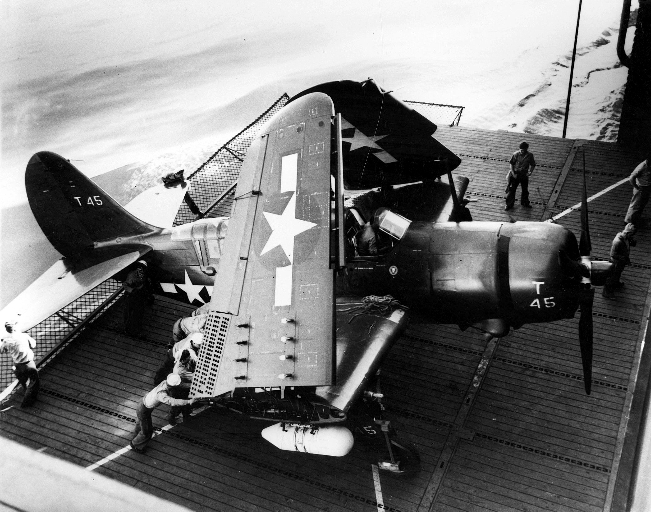 SB2C 5 Helldiver on elevator of aircraft carrier 1945