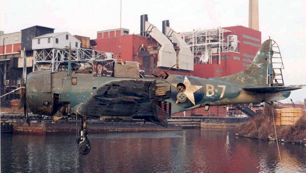 Battle of Midway combat veteran Douglas SBD-2 Dauntless (Bu.2106) shortly after salvage by A&T Recovery from Lake Michigan in 1994 (US Navy photo via Wikipedia) 