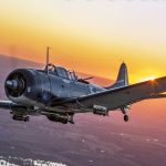 SBD in flight at sunset Kevin Hong