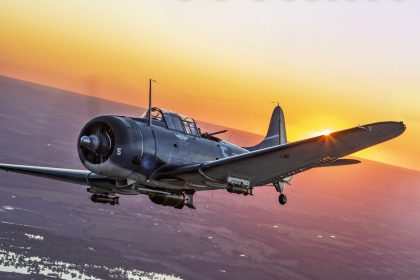 SBD in flight at sunset Kevin Hong