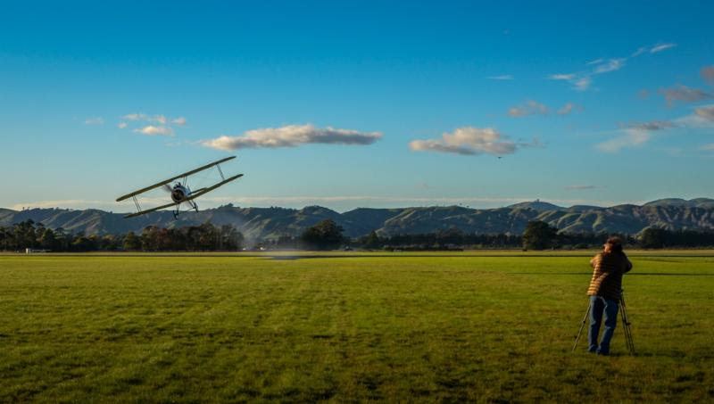 Sopwith Camel being photographed on location in New Zealand for the documentary "Millionaires Unit." Photo credit Harry Davison.