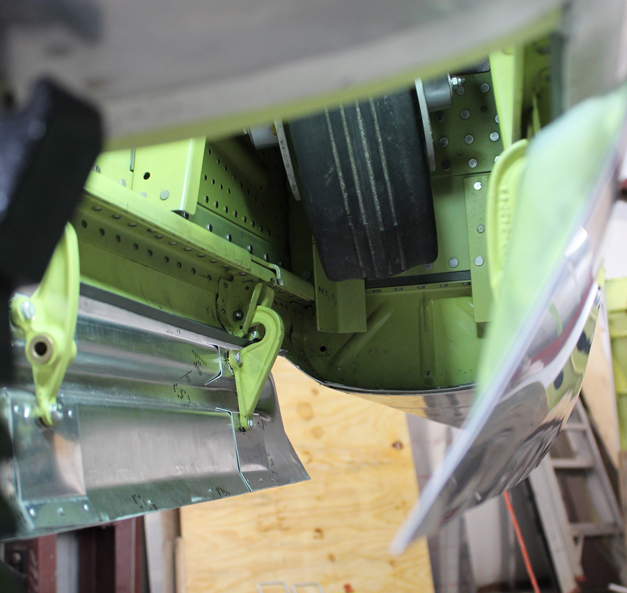 The tail wheel gear doors mounted in place during the test-fitting. (photo via Tom Reilly)