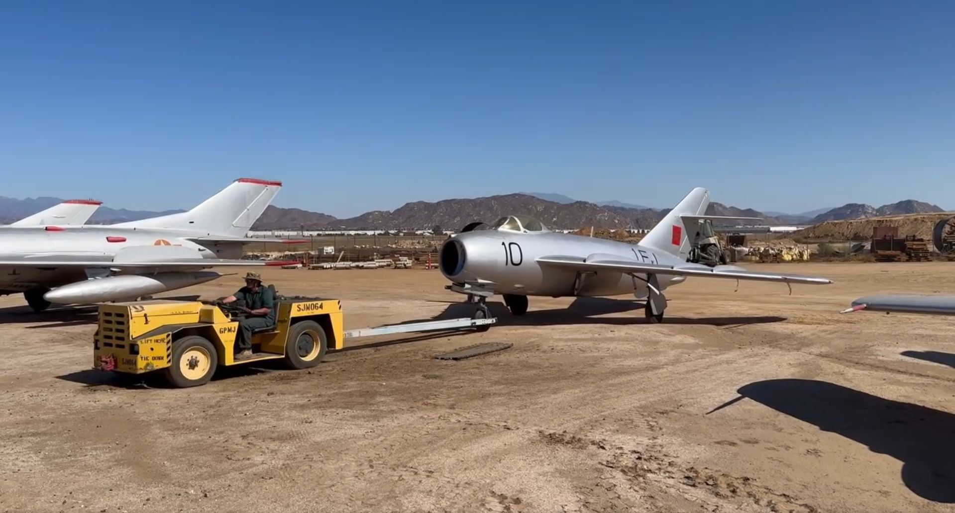 The MiG 17 being placed alongside the museums other MiG 17 and MiG 19 March Field Air Museum