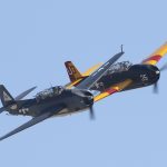 The Planes of Fame s TBM Avenger eft and Sanders Aeronautics TBM Avenger right come together in a formation pass