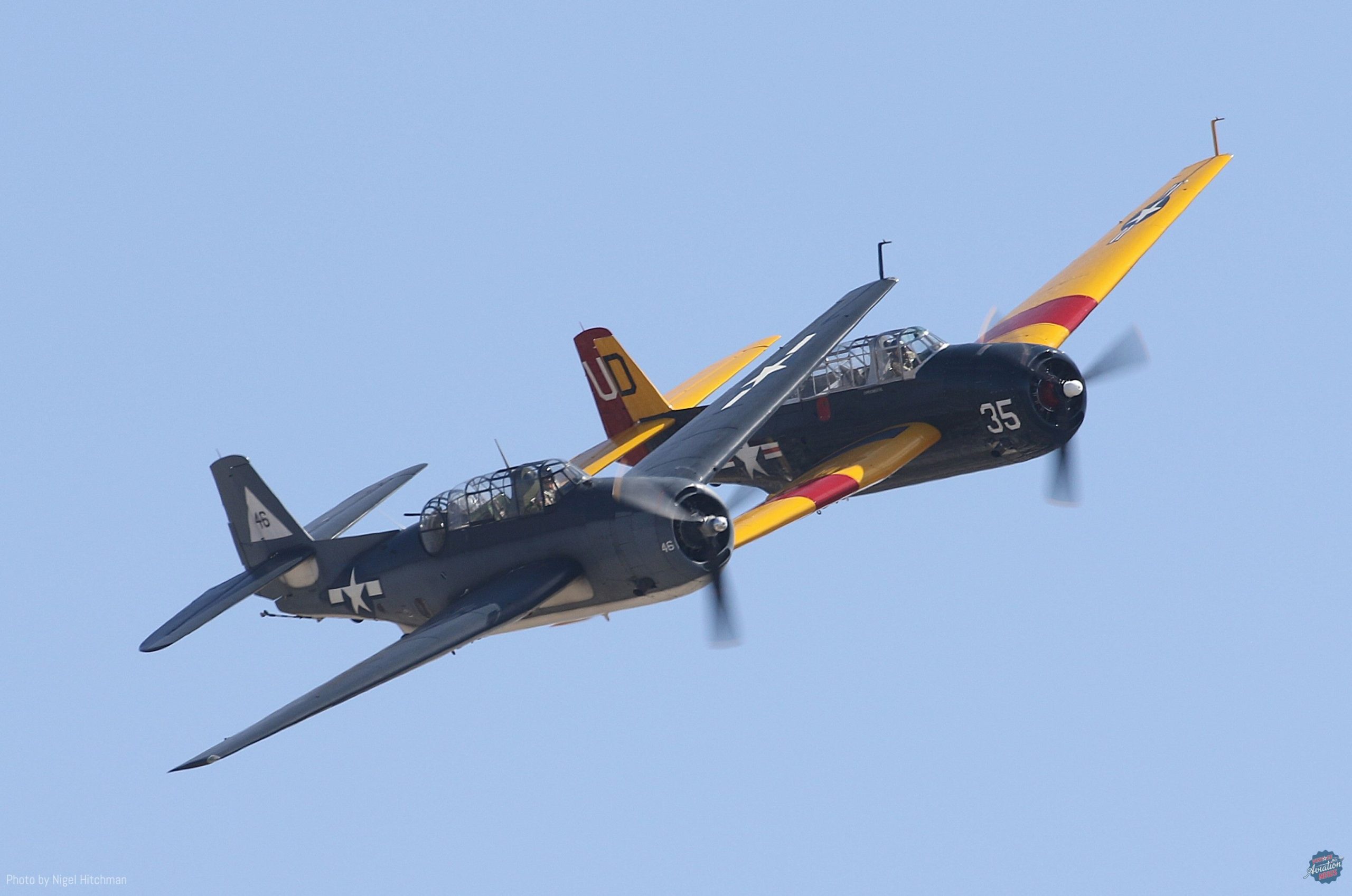 The Planes of Fame s TBM Avenger eft and Sanders Aeronautics TBM Avenger right come together in a formation pass scaled