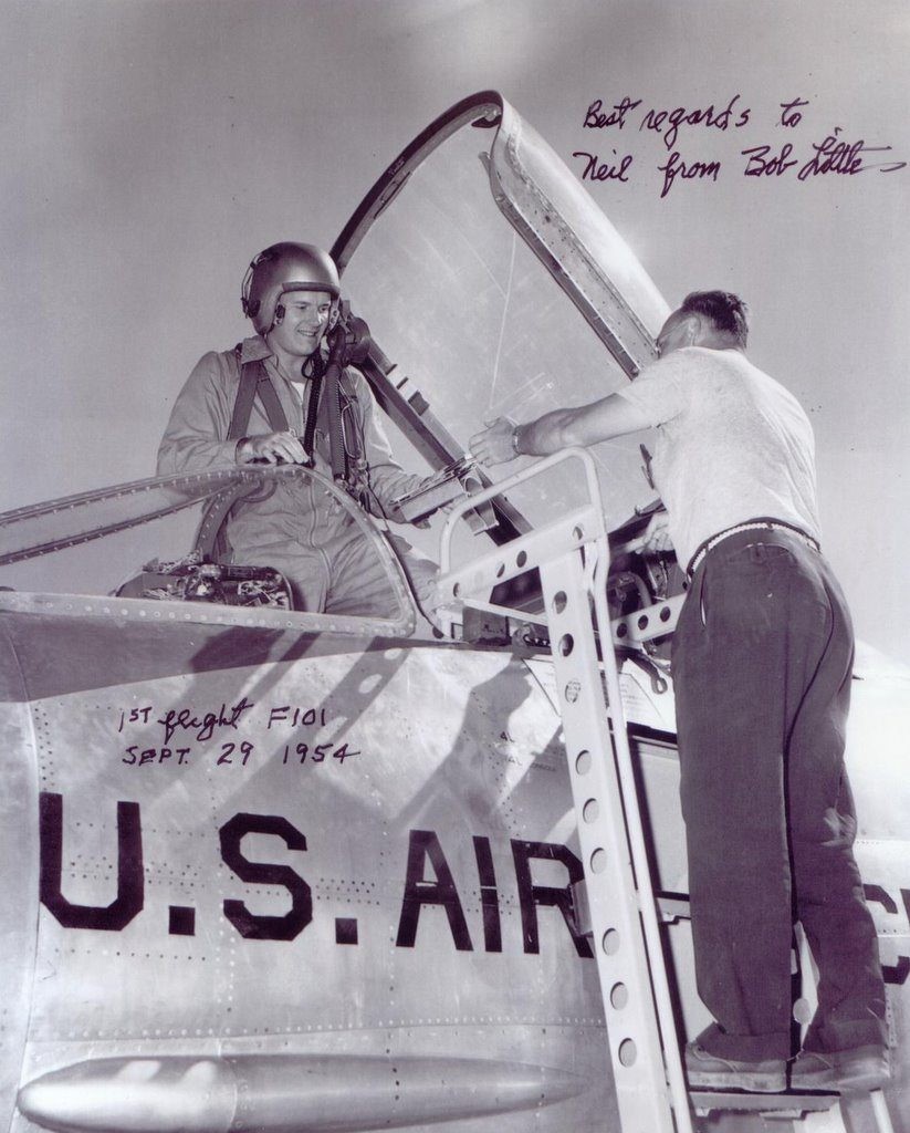 This is an autographed photo of test pilot Robert C. Little standing in the cockpit of the McDonnell F 101A Voodoo 53 2418 after its first flight 29 September 1954