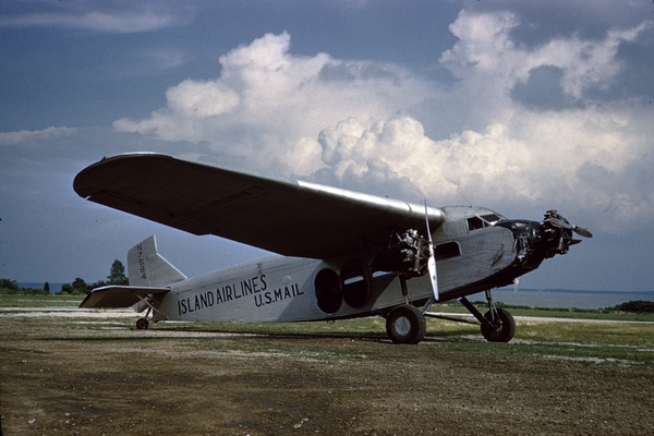 Though Island Airlines Fords would become quite colorful they started out with just bare metal as shown with N7584 before its red white and blue scheme American Aviation Historical Society