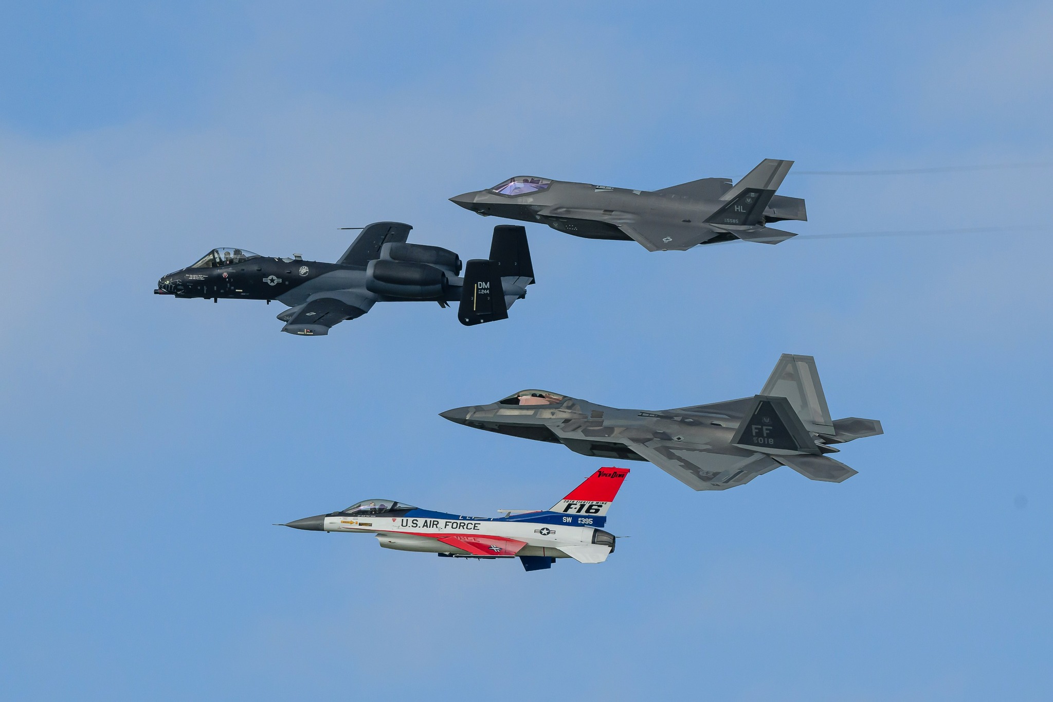 U.S. Air Force Heritage Flight from OSH24 featuring the F 35 A 10 Warthog F 22 and F 16. Photo by Dave Witty