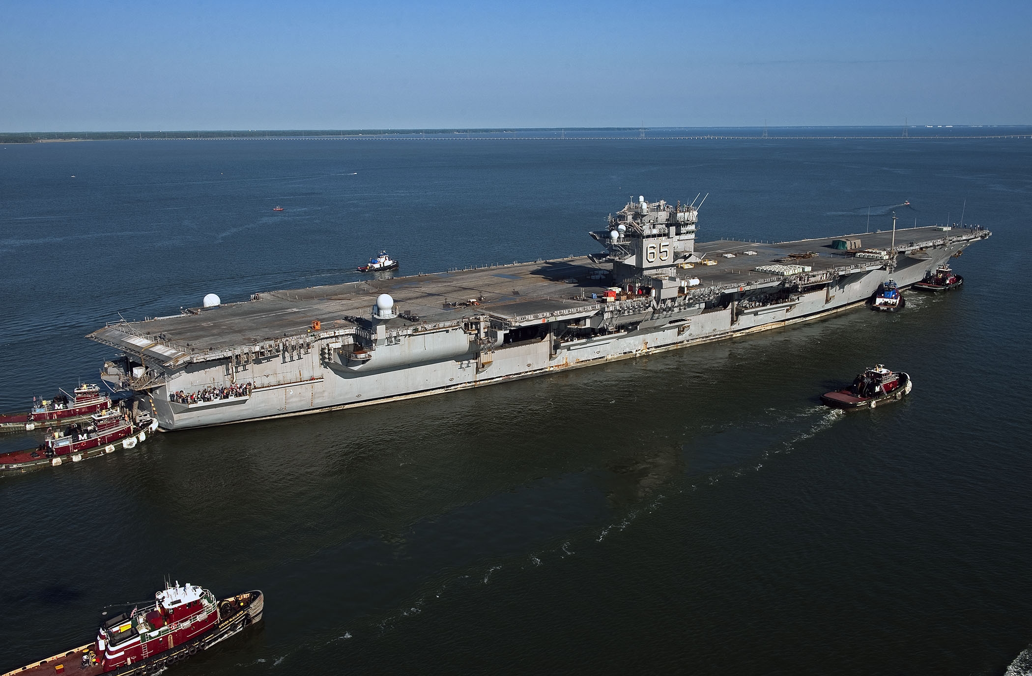 NORFOLK (June 20, 2013) The aircraft carrier USS Enterprise (CVN 65) makes its final voyage to Newport News Shipbuilding. The first nuclear-powered aircraft carrier will be dismantled at the shipyard prior to the scheduled commissioning of the next aircraft carrier Enterprise (CVN 80). (U.S. Navy photo courtesy of Huntington Ingalls Industries by John Whalen/Released) 130620-N-ZZ999-101 Join the conversation http://www.facebook.com/USNavy http://www.twitter.com/USNavy http://navylive.dodlive.mil http://pinterest.com https://plus.google.com
