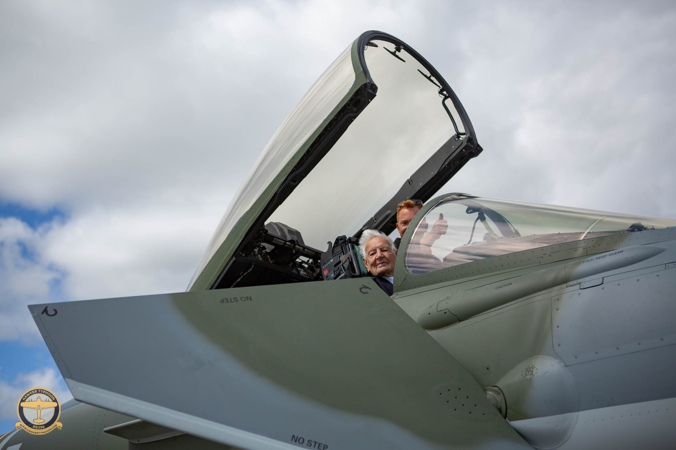 WWII Typhoon Pilot sitting in BBMF Eurofighter Typhoon