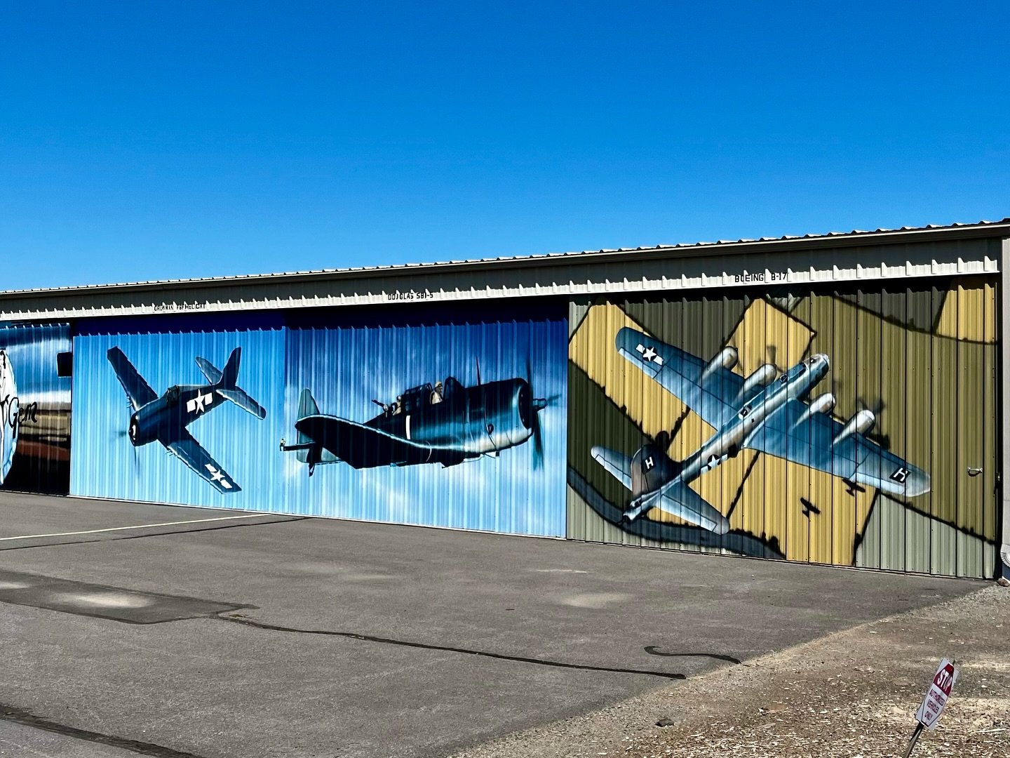 World War II Airplane Murals Painted on Oregon Airport Hangars ...