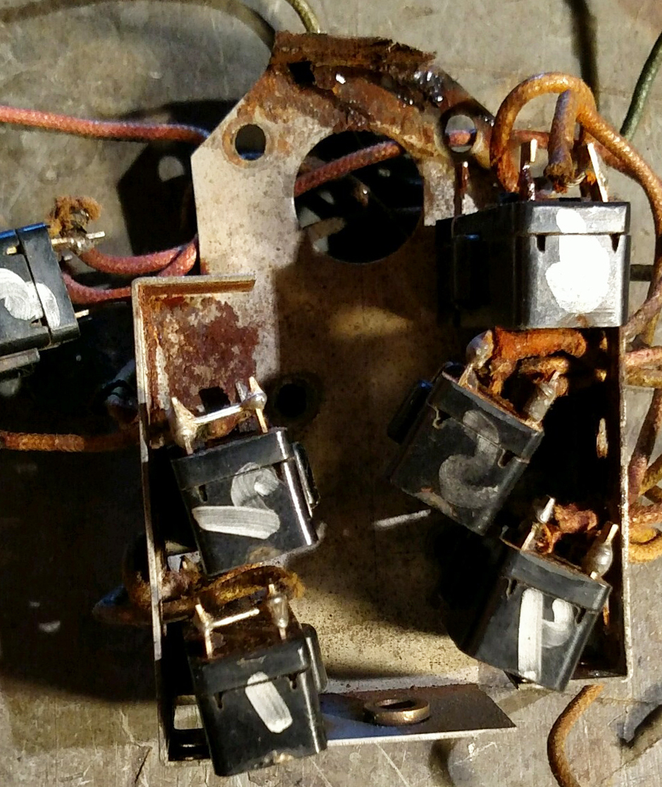 The heavily corroded interior of the XP-82 oil cooler door motor limit switch and gear housing. (photo via Tom Reilly)