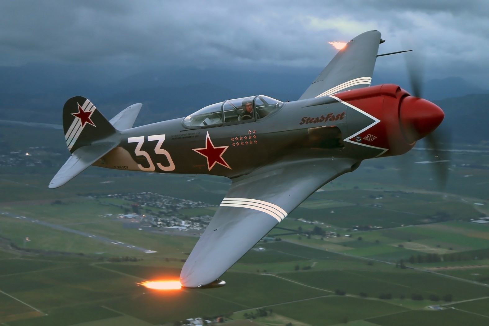 Yakolev 3 Steadfast with wingtip flames by Gavin Conroy