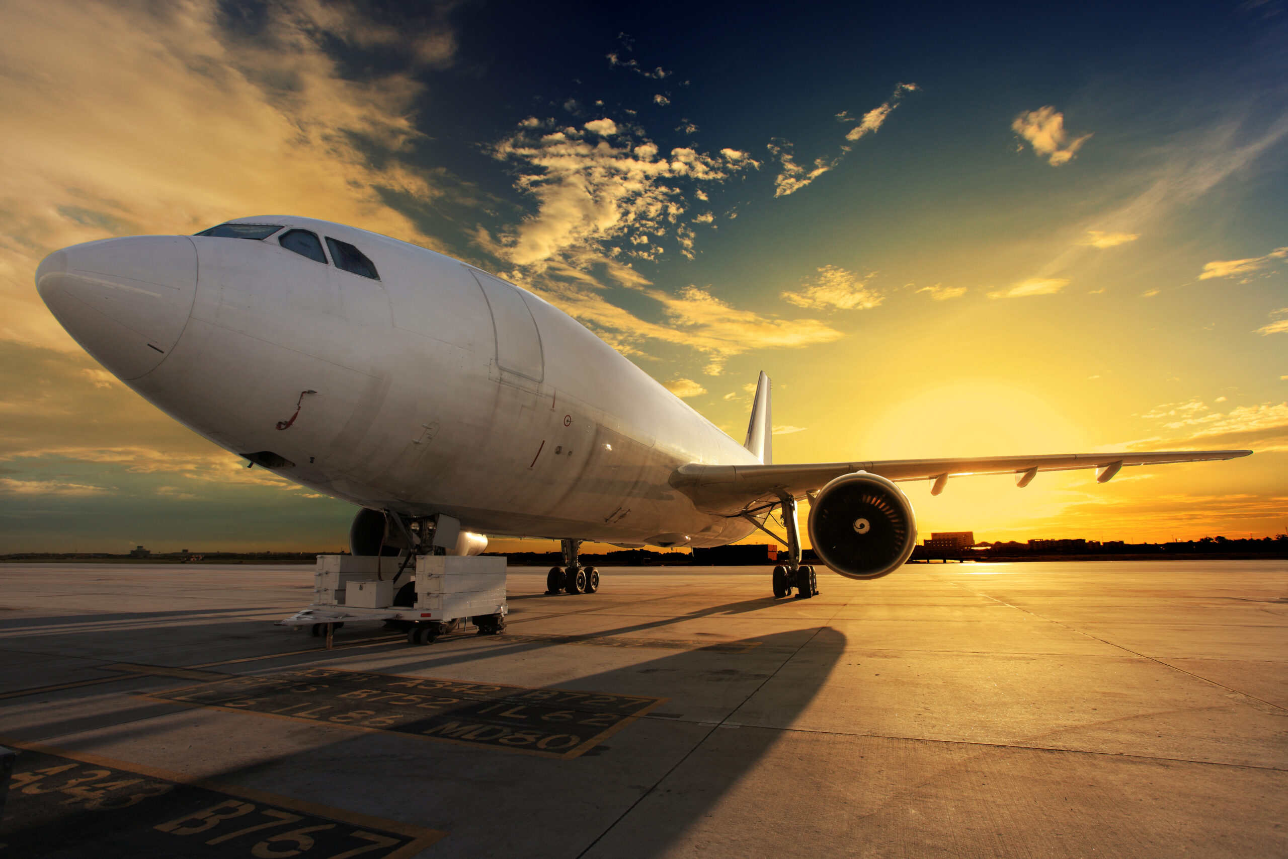 airline airplane sunset scaled