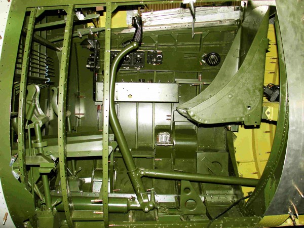 A detailed image of the CJFM Corsair cockpit during restoration. The joystick is actually from one of the Royal Navy Corsairs salvaged off the Gold Coast back in the 1990s. The seat, while not one manufactured by Vought, is an original, AN-standard seat approved by Vought as a substitute and temporarily fitted in while the armor plate is sourced. (image via CJFM)