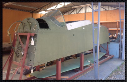 Mustang A68-71 as she sits now in her jigs. The Australian National Aviation Museum will restore her to ground-running condition for future generations of Australians with our help! (photo via ANMA)