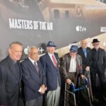 Tom Hanks with WWII veterans of the 100th Bomb Group. [Photo by Nicholas Kanakis]