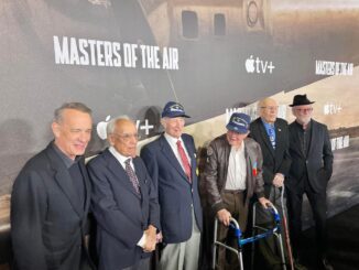 Tom Hanks with WWII veterans of the 100th Bomb Group. [Photo by Nicholas Kanakis]