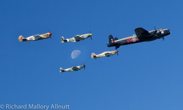 The Canadian Warplane Heritage Museum's Lancaster B.X in formation with the Vintage Wings of Canada fighters during the Battle of Britain flypast over Ottawa in 2011.