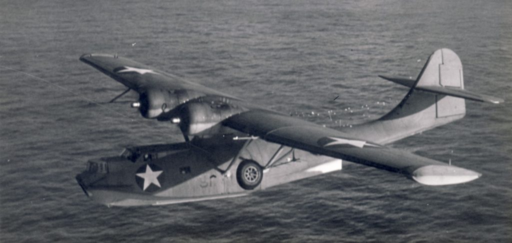 Into the Solomon Islands: Mark Roche’s Journey Through the Sunken Wrecks of WWII 20 pby low on water front scaled e1783809939701