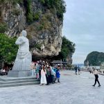 tourists taking pics titov statue ti top island vietnam