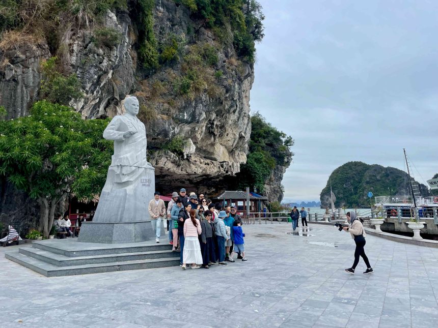 tourists taking pics titov statue ti top island vietnam