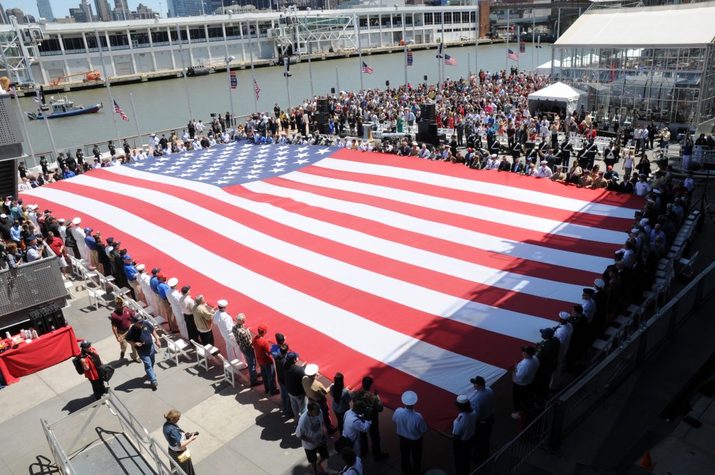 The National Museum of the U.S. Air Force Displays 9/11 Memorial Flag Through August 12 u.s. service members and veterans hold a 100 foot u.s. flag that was unfurled during the intrepid sea air and space museums memorial day ceremony in new york may 27 2013 130527 n nj247 002