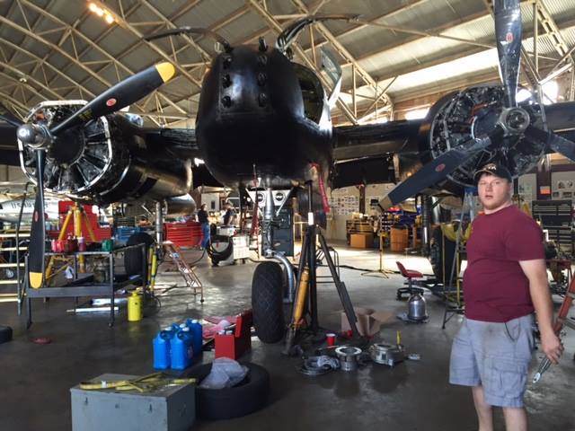 Working on the A-26 during winter maintenance. (photo via CAD A-26 Invader Squadron)